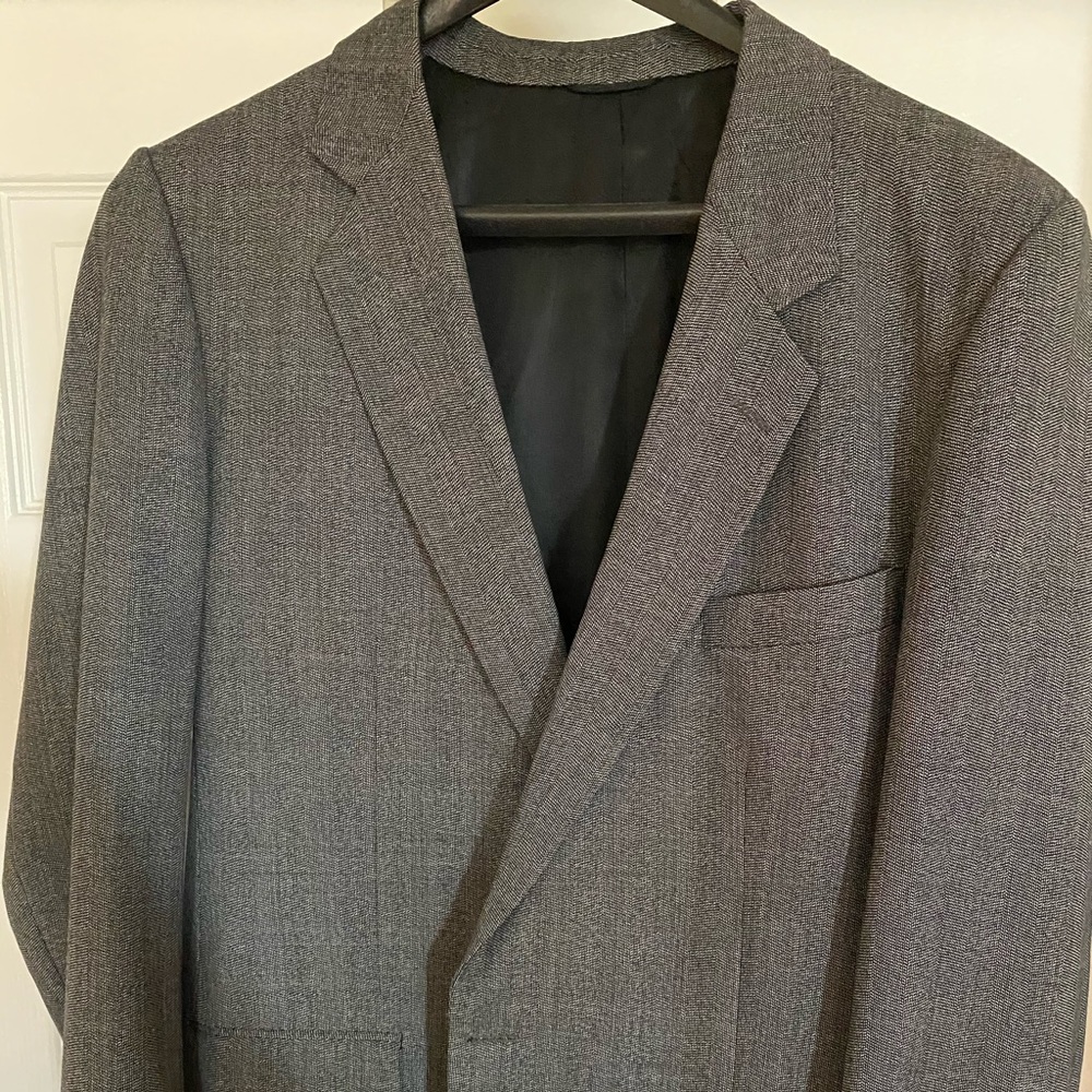 Grey sports coat.